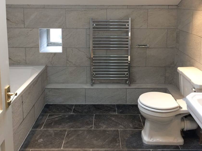 Family bathroom with heated towel rail | Inglenook Cottage, Kettlewell, near Grassington