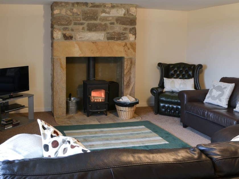 Cosy living room with wood burner | Grangemoor Barn, Scots Gap, near Morpeth