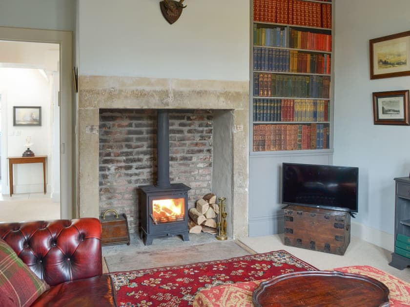 Welcoming living room with wood burner | Middleton Gate House, Middleton, near Belford