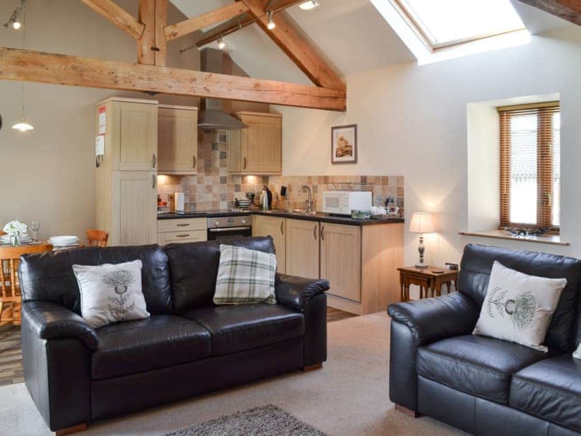 Open plan living space with vaulted ceiling | The Granary, Brompton by Sawdon