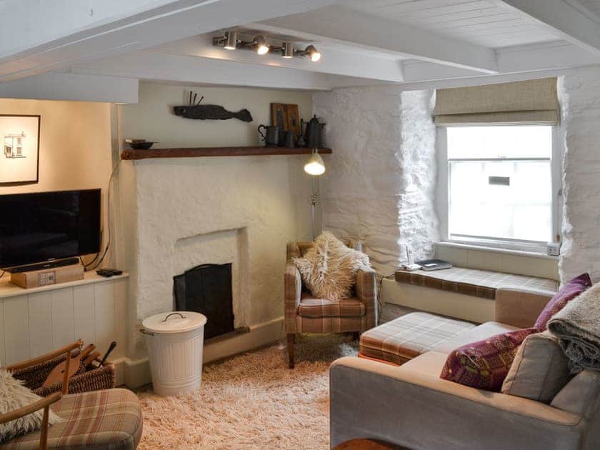 Cosy living space with open fire | Haven Cottage, Port Isaac