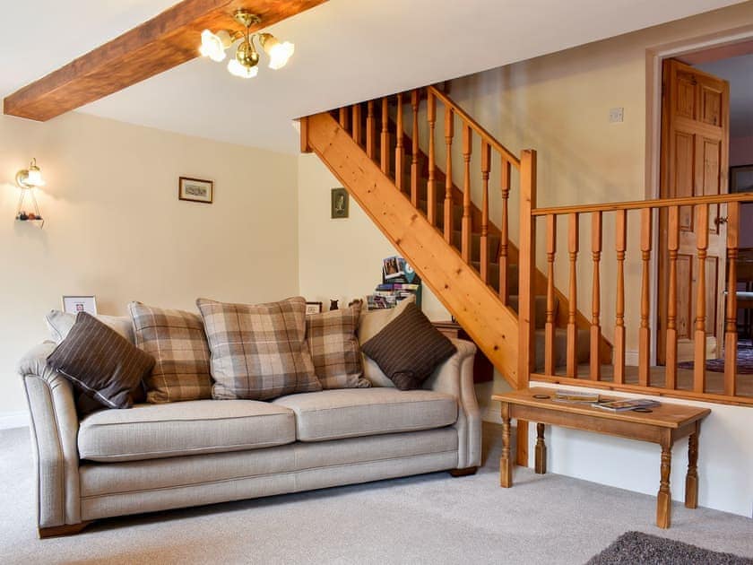 Comfortable living room with open fire | Barn Owl Cottage, Easby, near Richmond