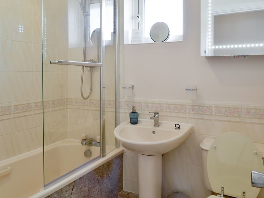 Family bathroom with shower over bath | Signals Court, Scarborough