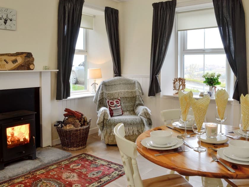 Cosy kitchen/ dining room | Glenhowl Lodge, Dalry, near Castle Douglas