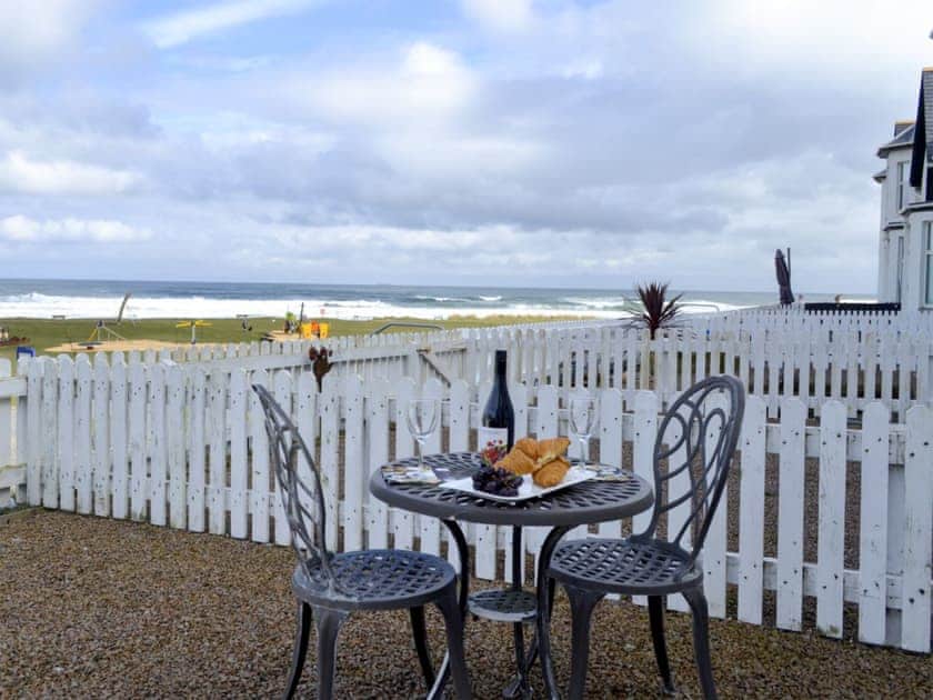 Enclosed, gravelled front patio with garden furniture and fantastic sea views | Seascape, Inverboyndie, near Banff