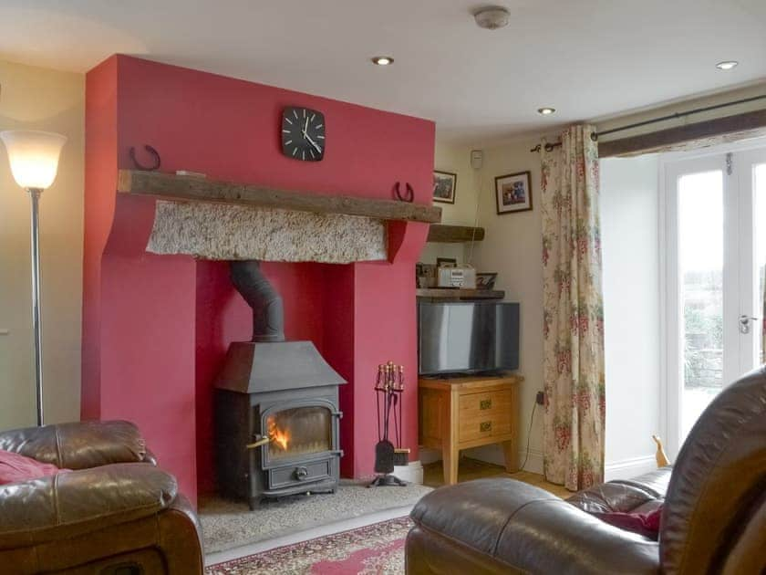 Inviting living area with wood burner | Barrow Tenement, Lyth Valley, near Kendal