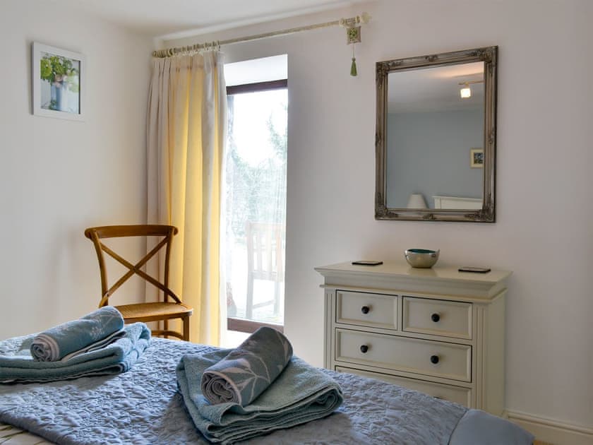 Tranquil bedroom with kingsize bed and en-suite | Hilltop Barn, Starbotton, near Skipton