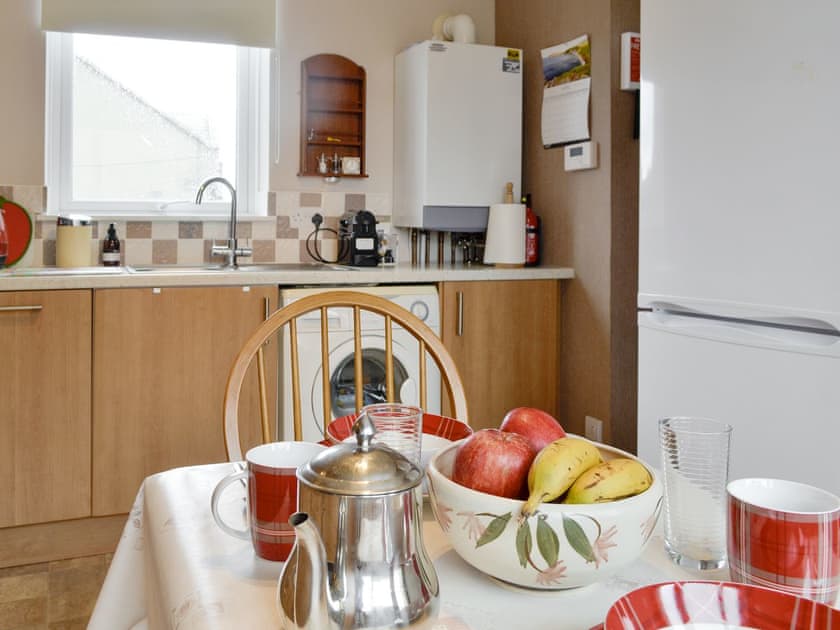 Well-equipped kitchen with dining area | Westcliff, Whitehills, near Banff