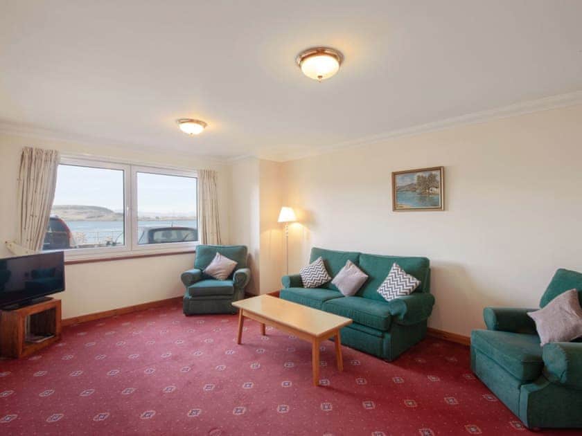 Spacious living room with wonderful views | Esplande Apartment, Oban, Argyll