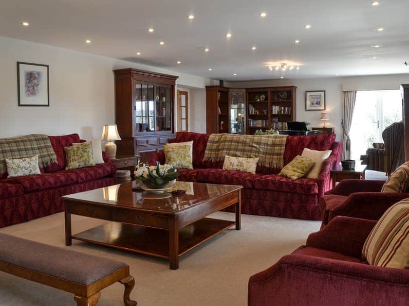 Spacious, thoughtfully furnished living room | Bodrydd - Bodrydd, Rhoshirwaun, near Pwllheli