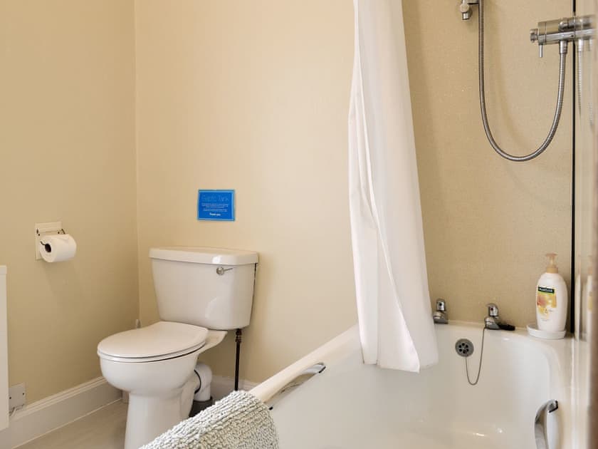 Family bathroom with shower over bath | Blairhosh Cottage, Balloch, Loch Lomond