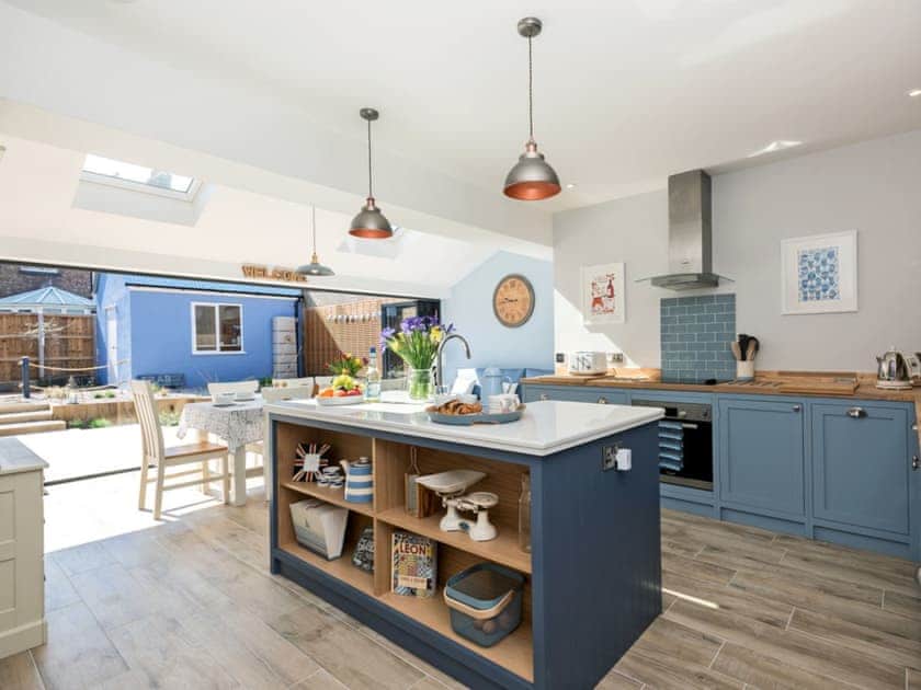 Light and airy kitchen/dining room leading to garden | Ascot Villa, Sheringham