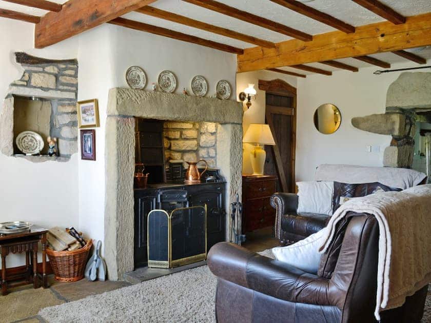 Warm and welcoming living room with open fire | Far View Cottage, near Haworth