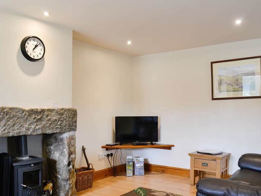 Cosy and comfortable living area with wood burner | Mill Barn, Hebden, near Grassington