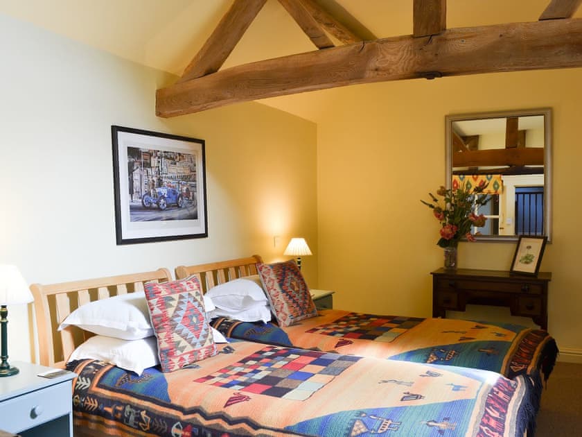 Twin bedded room with beams | Bugatti House, Bosbury, near Ledbury