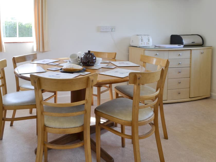 Convenient dining area within kitchen | The Lodge - Scarning Dale Cottages, Scarning, near Dereham