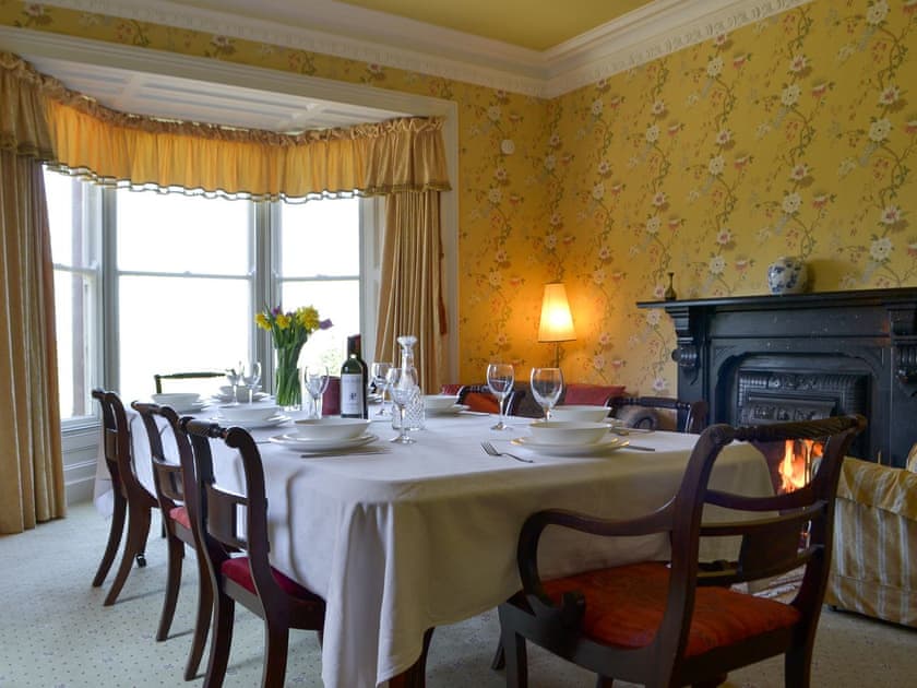 Large dining room with open fire | Tirril Lodge, Tirril, Ullswater