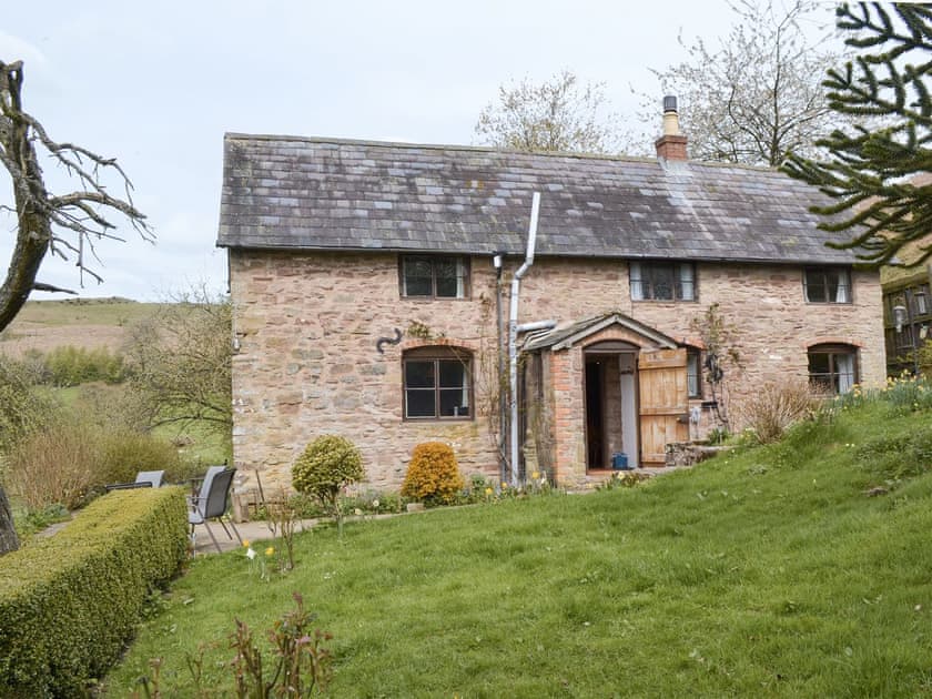 Spacious garden area | Titchbourne Cottage, Clee St Margaret, near Ludlow