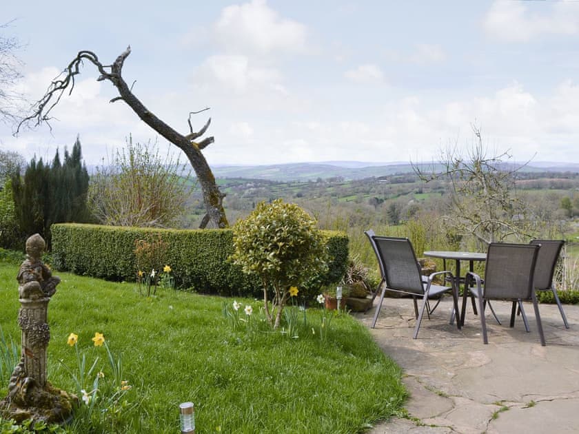 Patio with outdoor furniture | Titchbourne Cottage, Clee St Margaret, near Ludlow