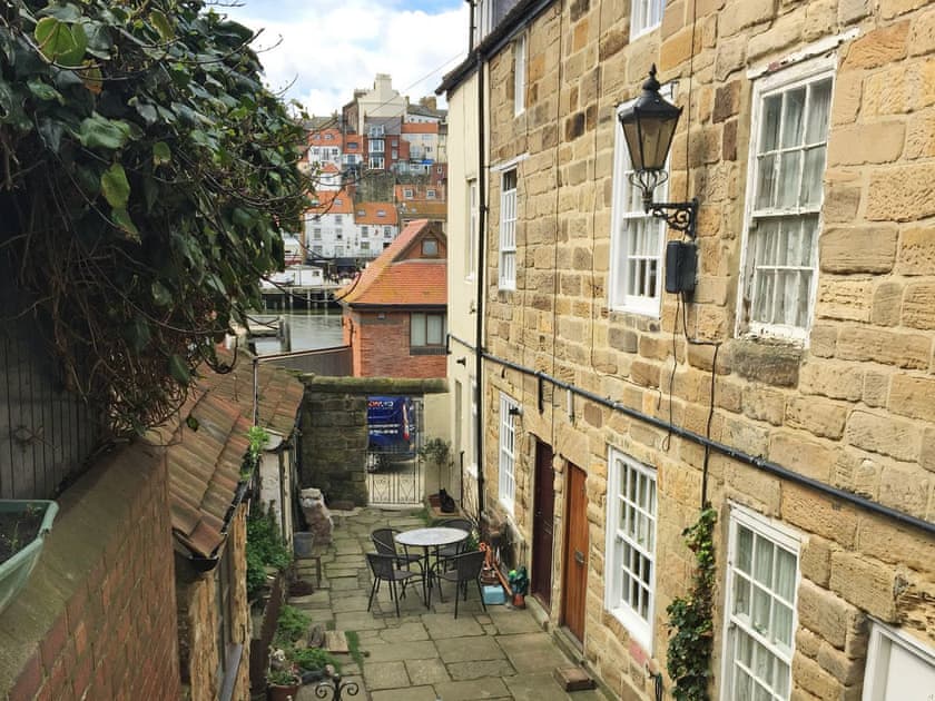 Charming courtyard at rear of property | Cor Cottage, Whitby