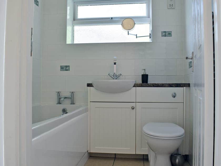 Bathroom with shower over bath | Moles Leap, Brading