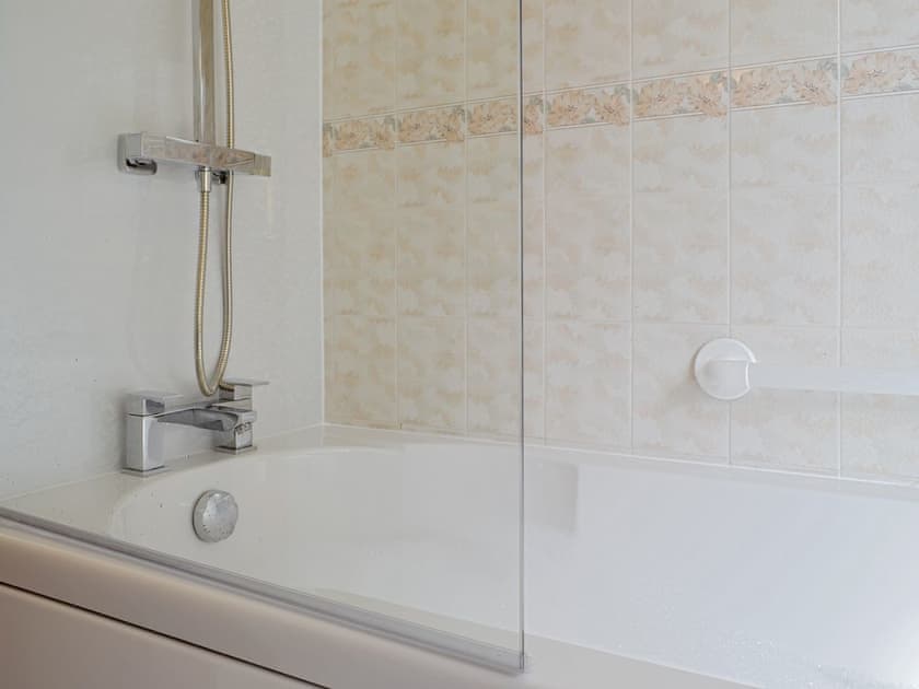 Family bathroom with shower over bath | Three Views Bungalow, Talgarth, near Hay-on-Wye