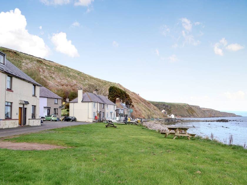 Terraced cottage, directly overlooking the sea at Burnmouth Harbour | Archie’s Cottage, Burnmouth, near Eyemouth