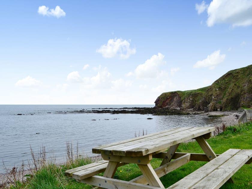 Seating area with sea views | Archie’s Cottage, Burnmouth, near Eyemouth