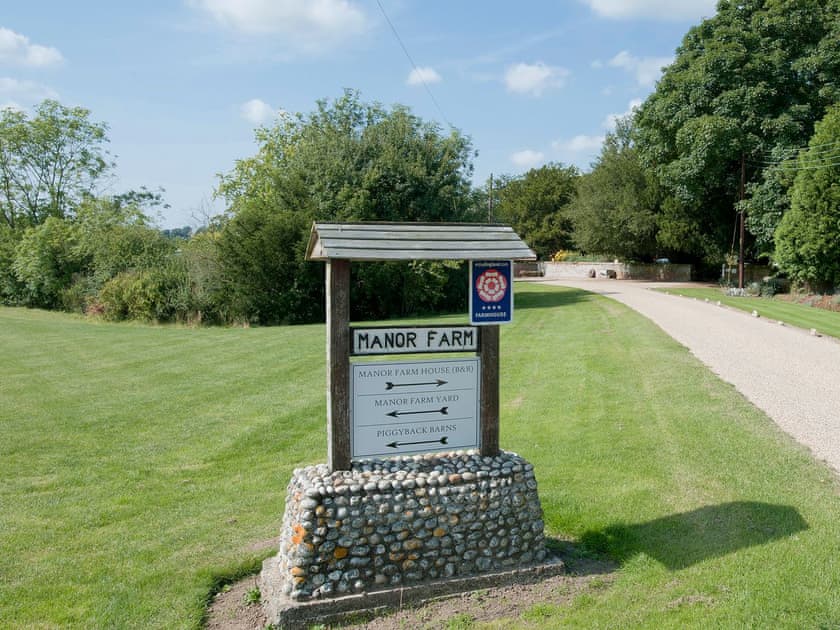 The barns form part of the manor Farm estate | Kingfisher Barn - Piggyback Barns, Sculthorpe, Fakenham