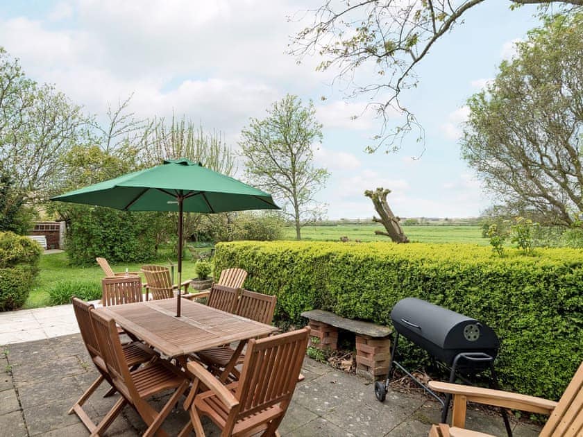Peaceful patio area with BBQ | Church Cottage, Denford, near Thrapston