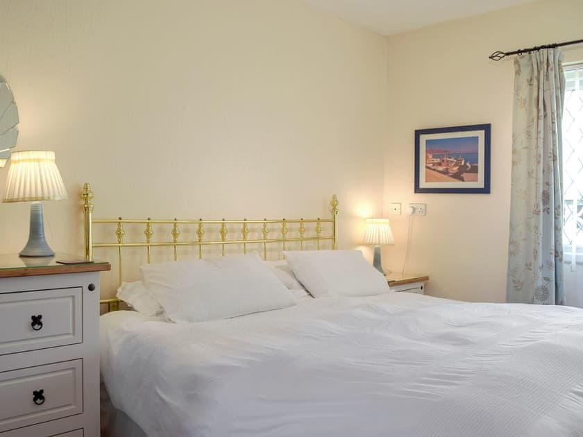 Double bedrooom with an additional bunk bed | Green Acre Cottage, Kilgetty, Dyfed 