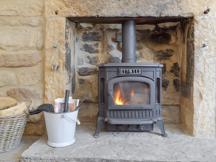 Welcoming wood burning fire | Blackcurrant Cottage at Stanton Ford Farm, Baslow, near Bakewell