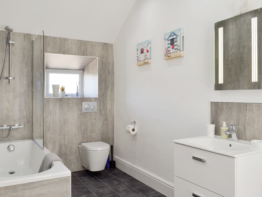Family bathroom with shower over bath | Blackcurrant Cottage at Stanton Ford Farm, Baslow, near Bakewell