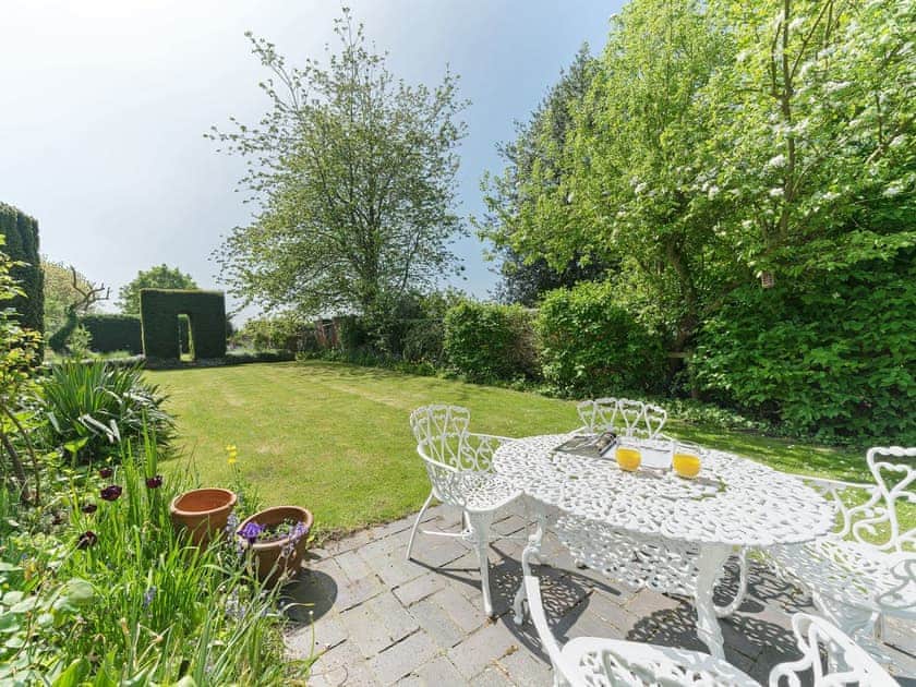 Peaceful sitting-out-area overlooking garden | Manor Cottage, Eckington, near Pershore
