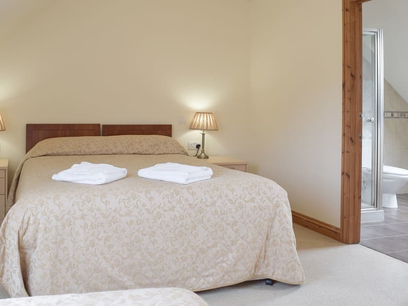 Double bedroom with an additional single bed | Pentre Cottage - Three Rivers Farm Cottages, Ferryside