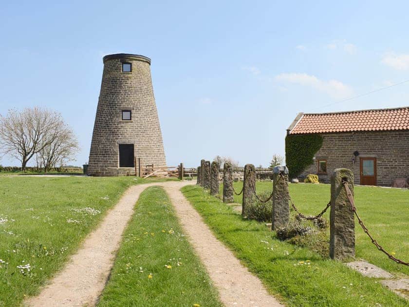 Characterful old windmill next to the holiday home | Mill View Cottage, Ravenscar, near Robin Hood’s Bay