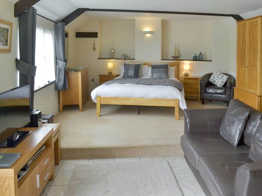 Attractive studio-style interior | The Lodge - Talehay Cottages, Pelynt, near Looe