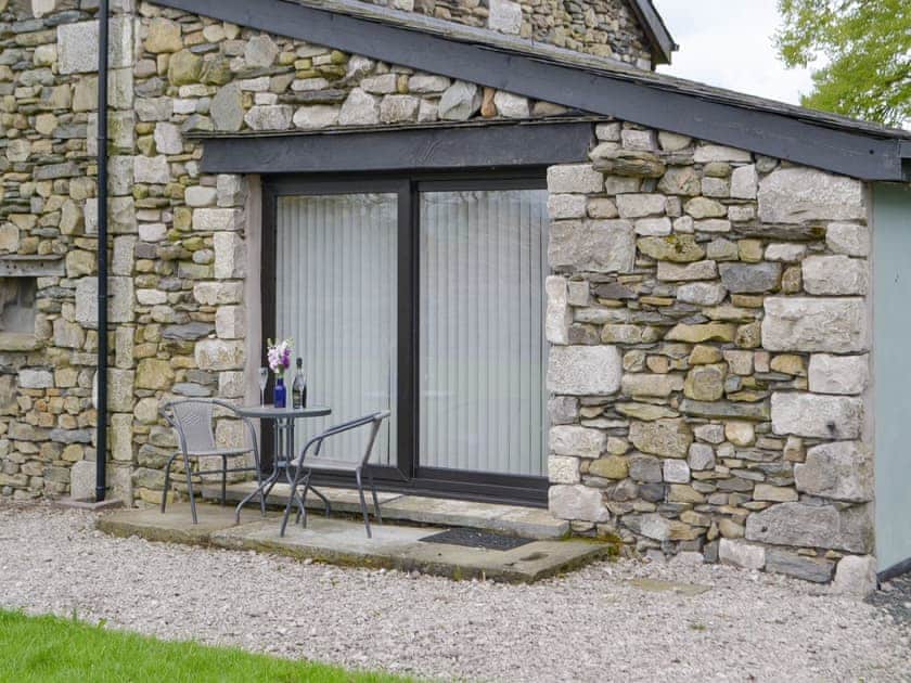 Patio area with outdoor furniture | The Den - High Thorn Farm Cottages, Selside near Kendal