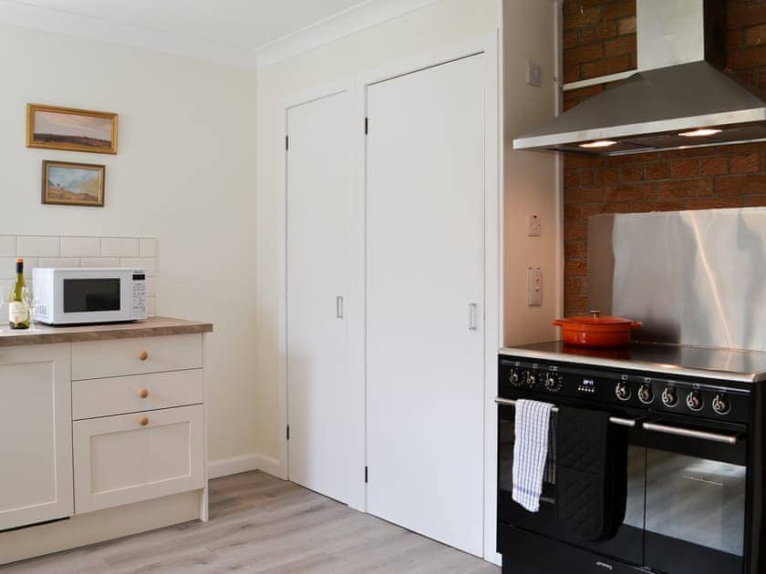 Kitchen with range cooker | Invernoe Cottage, Taynuilt, near Oban