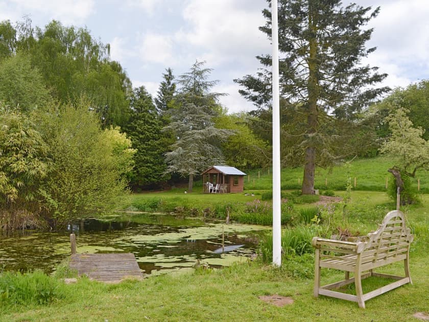 Well-maintained garden with tranquil pond | The Mill House, Lea, near Ross-on-Wye