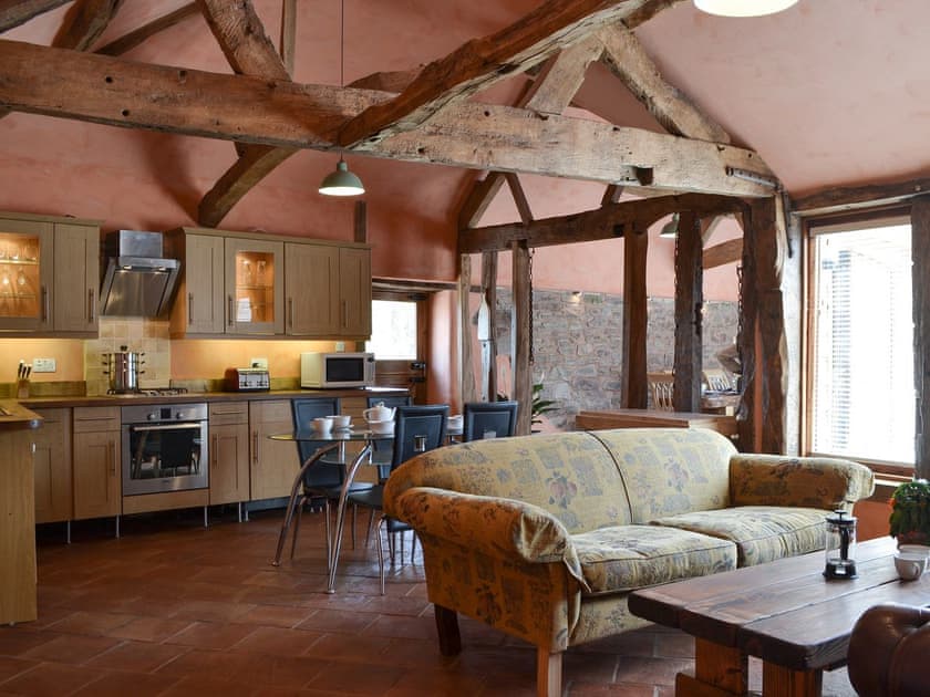 Open plan living space with wood beams | The Cart Shed, Knapton Green, near Leominster