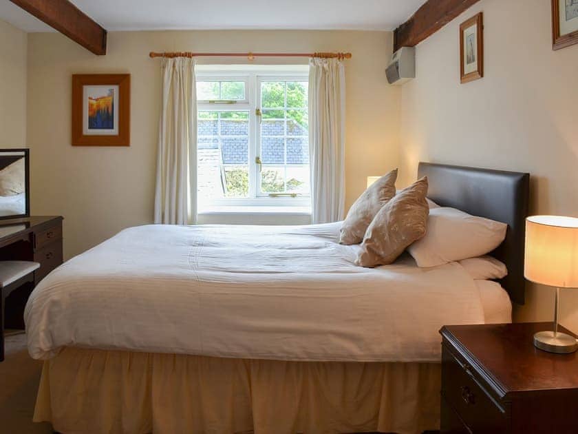 Warm and welcoming double bedroom | Granary - Trimstone Manor Cottages, Trimstone, near Woolacombe