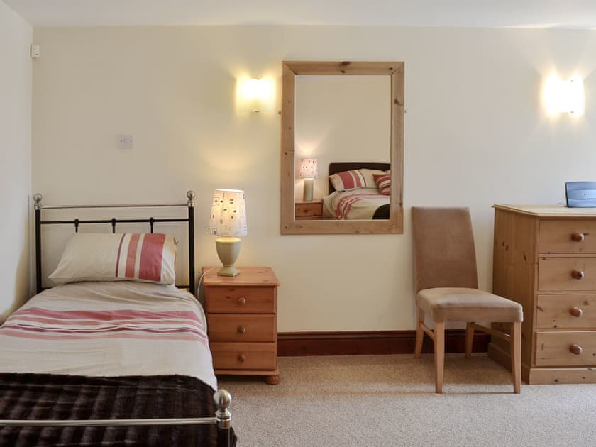Bedroom with double bed and an additional single bed | Trescowthick Barn, St Newlyn, near Newquay
