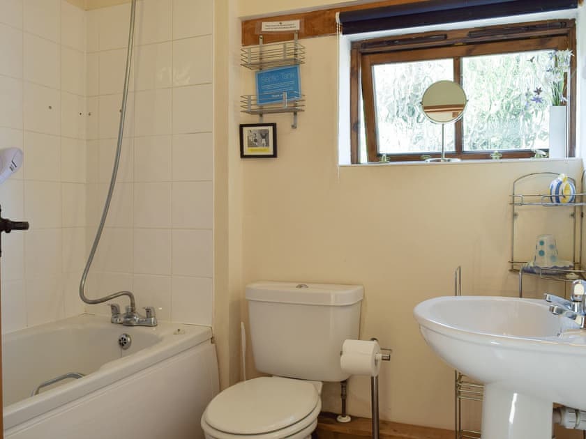 Family bathroom with shower over bath | The Cotes, Upper Welland, near Malvern