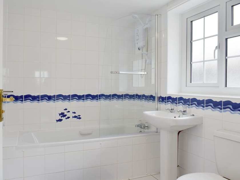 Family bathroom with shower over bath | Rudda Farm Cottage - Rudda Farm Cottages, Staintondale, near Whitby