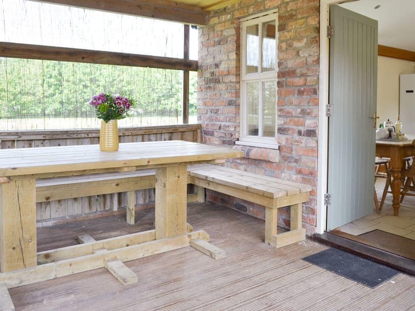 Covered seating area | Four Bays - Struncheon Hill Farm, Brandesburton, near Bridlington