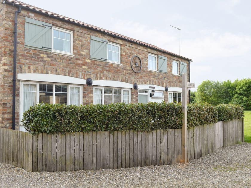 Attractive façade | Four Bays - Struncheon Hill Farm, Brandesburton, near Bridlington