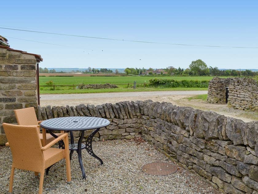 Delightful countryside views fomthe sitting out area | Pear Tree Cottage - Hagg Farm Cottages, Kirkbymoorside