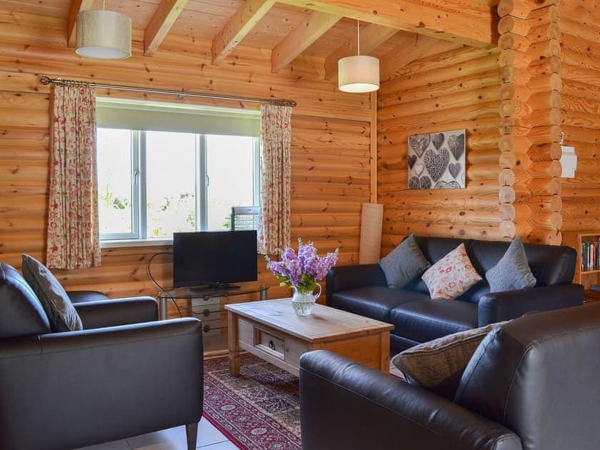 The open plan living area benefits from air-source underfloor heating | Quail Lodge - Mackinder Farms, Brayton, Selby