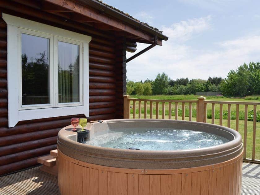 Relax in your own private hot tub | Quail Lodge - Mackinder Farms, Brayton, Selby